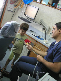 Dr. Keledjian with a patient