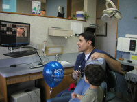 Dr. Keledjian with a patient