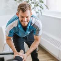 Dr. Michael Melander working on a patient