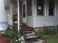 Parking and patient enterance behind the house.