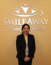 Dr Ammal in black