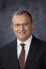 Adrian Caracioni, MD