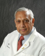 Dr. Arnold H Menezes, MD