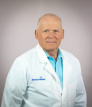 Gerald Travis, MD