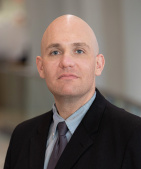 James M. Szymanski, MD