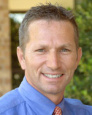 John T Wells, MD
