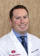 Isaac J Adatto, MD