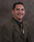 Albert G Ruezga, DDS