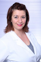 Dr. Olga Beckinger, DDS