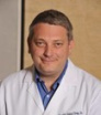 Alexander E Schuetz, MD