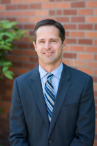 Dr. Neil E. Roberts, MD