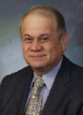 Dr. Luis E. Bustos, MD