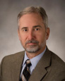 Dr. Bruce E. Henson, MD