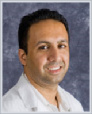 Dr. Adil Mohamed Roomi, MD