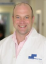 Dr. Christian Menard, MD, PhD