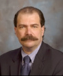 Dr. Alain L. Heroux, MD
