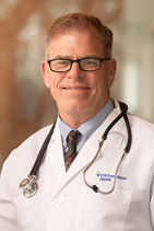 Richard E Standaert JR., MD