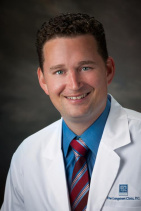 Curtis Malcom, MD