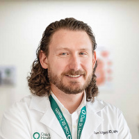 Dr. Thomas W. Longley, MD