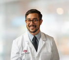 Adel M. Barkat, MD