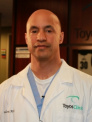 Rolando Toyos, MD