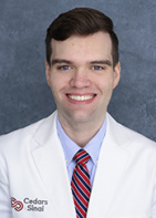 Travis R Hallett, MD