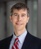 James C. Brust, MD