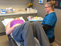 Nurse performing blood draw on a patient for a PRP procedure. 1