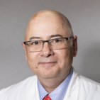 John C. DeToledo, MD