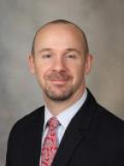 Travis J McKenzie, MD
