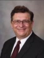 John A Lust, MD
