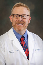 Corey Johnson, MD