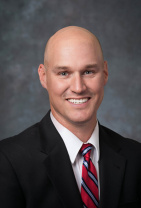 Dr. Travis F. Wiggins, MD