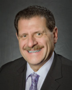 Dr. Giles R. Scuderi, MD