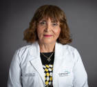 Dr. June Defas, MD