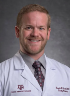 Travis Gregg Tomek, MD