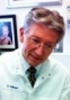 Mark E. Ballinger, DDS