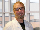 Travis Carroll, MD