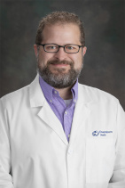 M. Damon Kolok, MD