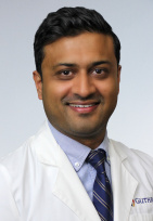 Poolak Bhatt, MD, DMD