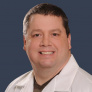 James E. Thompson, MD