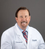 J. Kevin Belville, MD