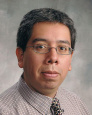 Carlos M. Flores, MD