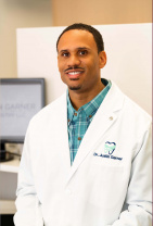 Dr. Justin J Garner, DDS