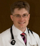 Dr. Eugene F. Tharalson, MD