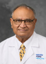 Divyakant B Gandhi, MD
