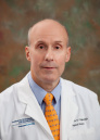 Mark E. Coggins, MD