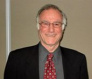 John E Handelsman, MD, FRCS, MCHORTH