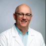 Mark L. Dake, DDS