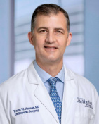 Travis Hanson, MD